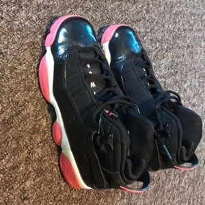 Pink and black Jordan’s